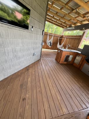 Alabama Deck Restoration logo featuring a house, a paintbrush, and the slogan Love Your Deck Again.