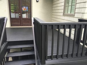 Alabama Deck Restoration logo featuring a house, a paintbrush, and the slogan Love Your Deck Again.