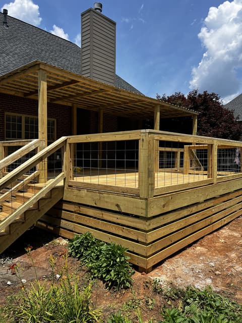 Alabama Deck Restoration logo featuring a house, a paintbrush, and the slogan Love Your Deck Again.