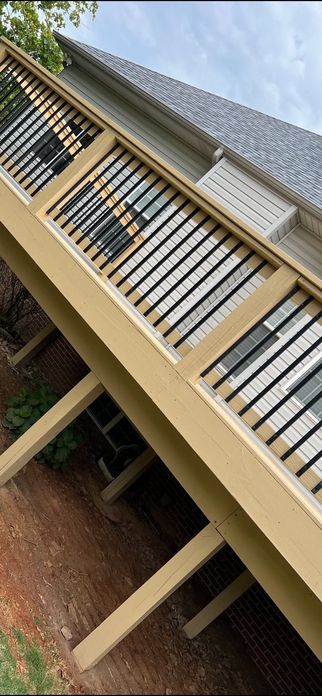Alabama Deck Restoration consulting a client for deck restoration in Birmingham