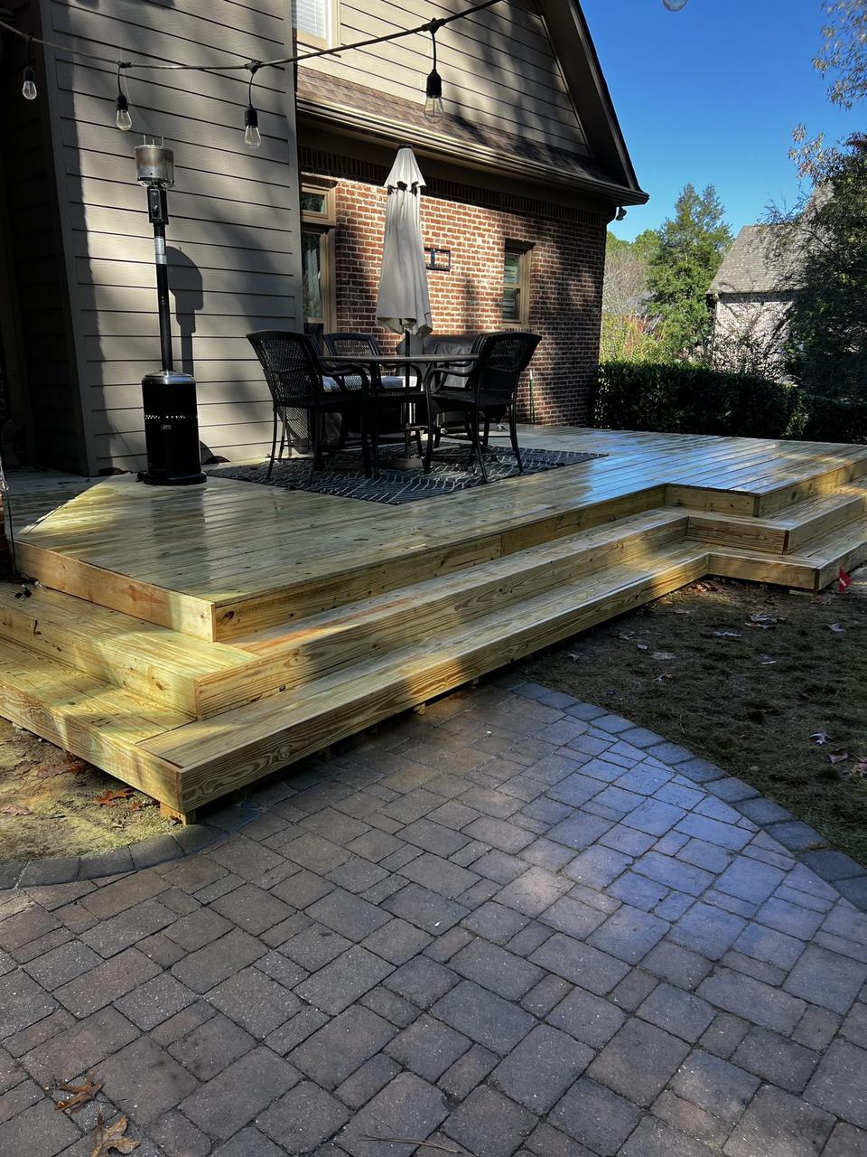 Deck consultation in Birmingham AL examining structural integrity and surface condition for an accurate deck restoration quote